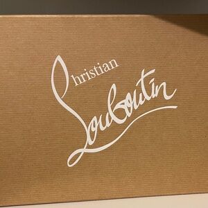 Never worn patent Louboutin